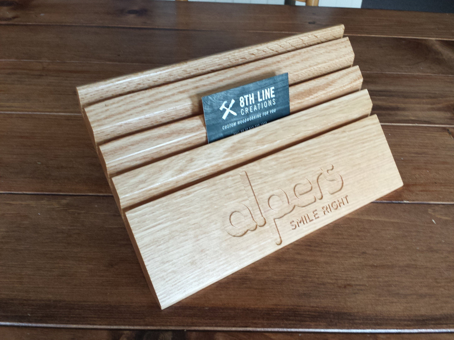 Wooden business card holder with carved logo holds 10 different cards Business Card Stands 8th Line Creations